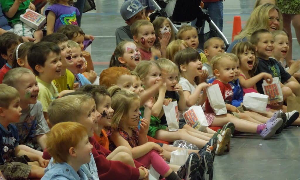 Kid's at a birthday party enjoying Richard Rondeau's magic show