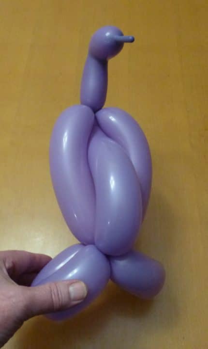 Balloon twisted into a penguin shape by Richard Rondeau Calgary magician