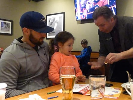 Magician Richard Rondeau performing walk around magic