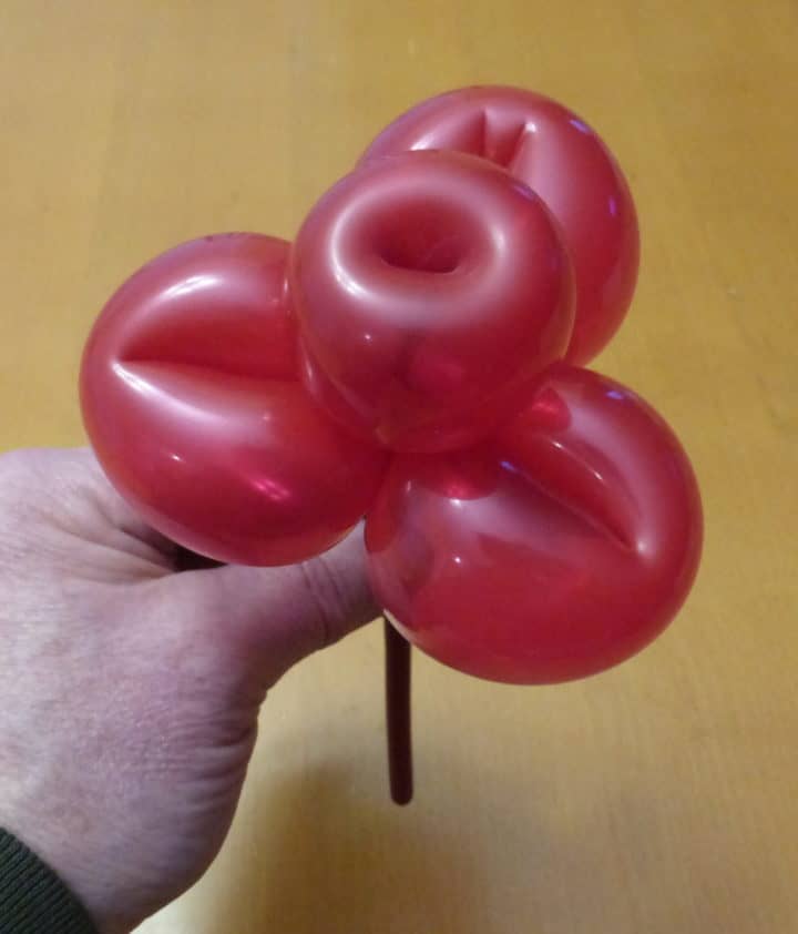 Calgary magician Richard Rondeau sculpts a balloon into a flower