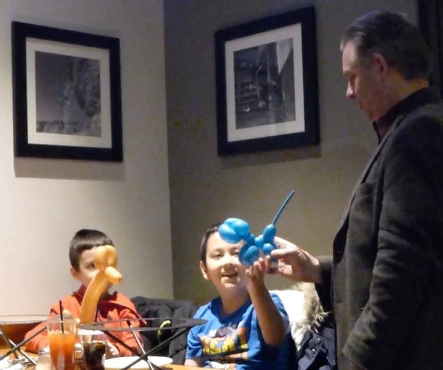 Calgary magician Richard Rondeau entertaining children